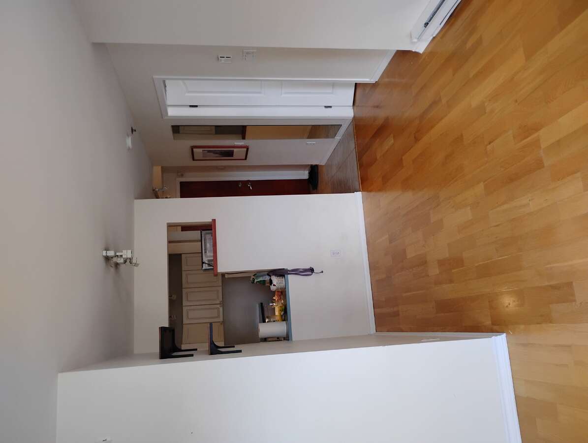Looking from Living area towards dining area, kitchen and entrance.