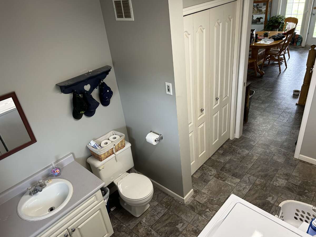 Main floor Laundry and 2 piece bathroom