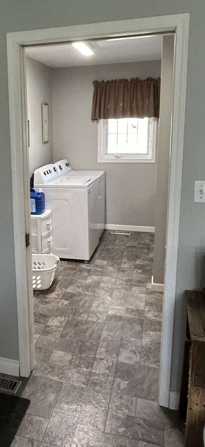Main floor Laundry and 2 piece bathroom