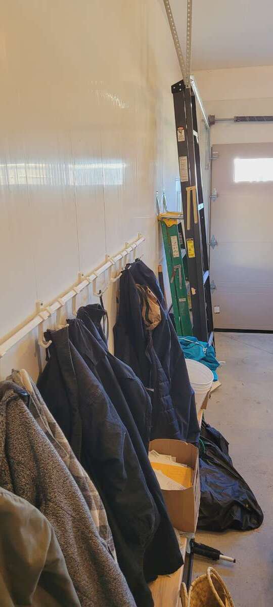 garage finshed in trusscore walls and ceiling, and  heated floor