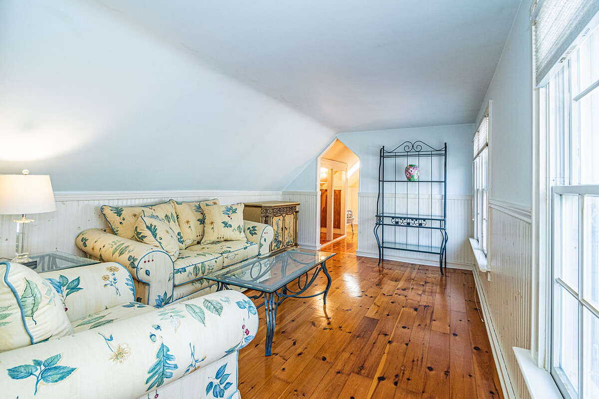 Top floor bedroom or flex room, flooded with natural light