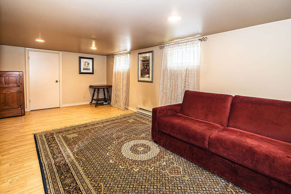 Finished basement recreation room or guest room.