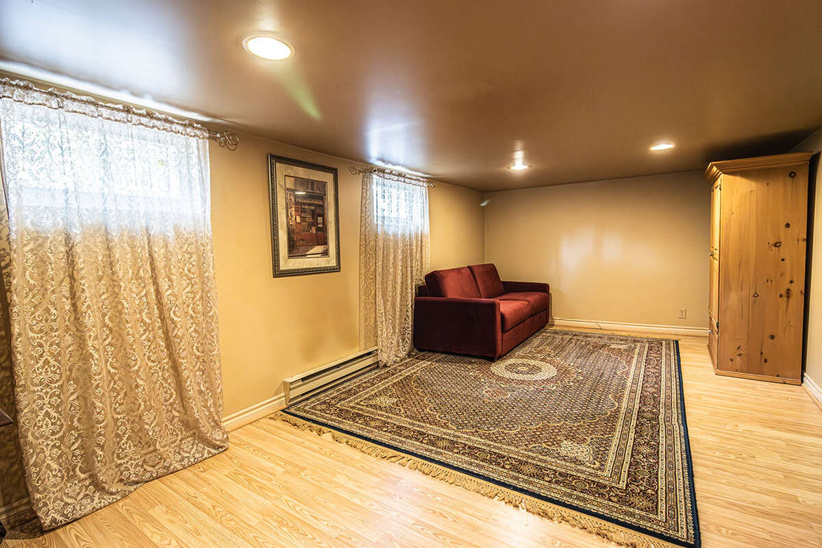 Finished basement recreation room or guest room.