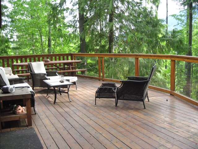Upper deck surrounded by cedars