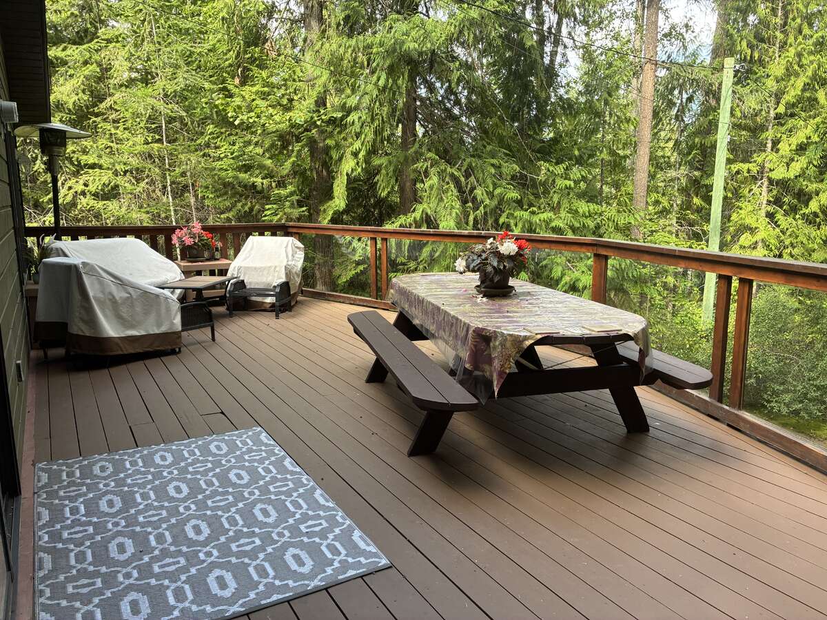 Upper deck surrounded by cedars