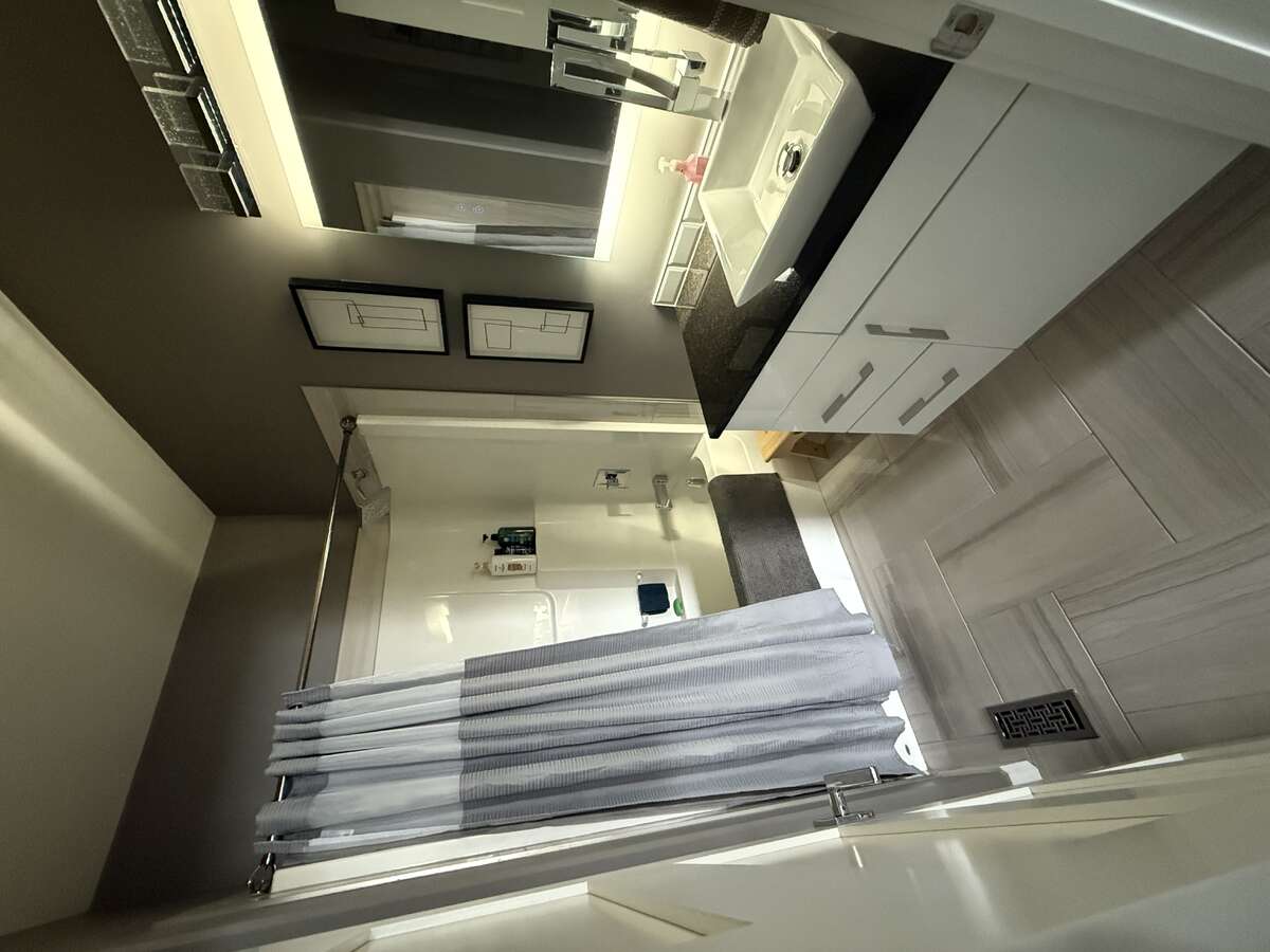 main bathroom w/ bluetooth mirrors