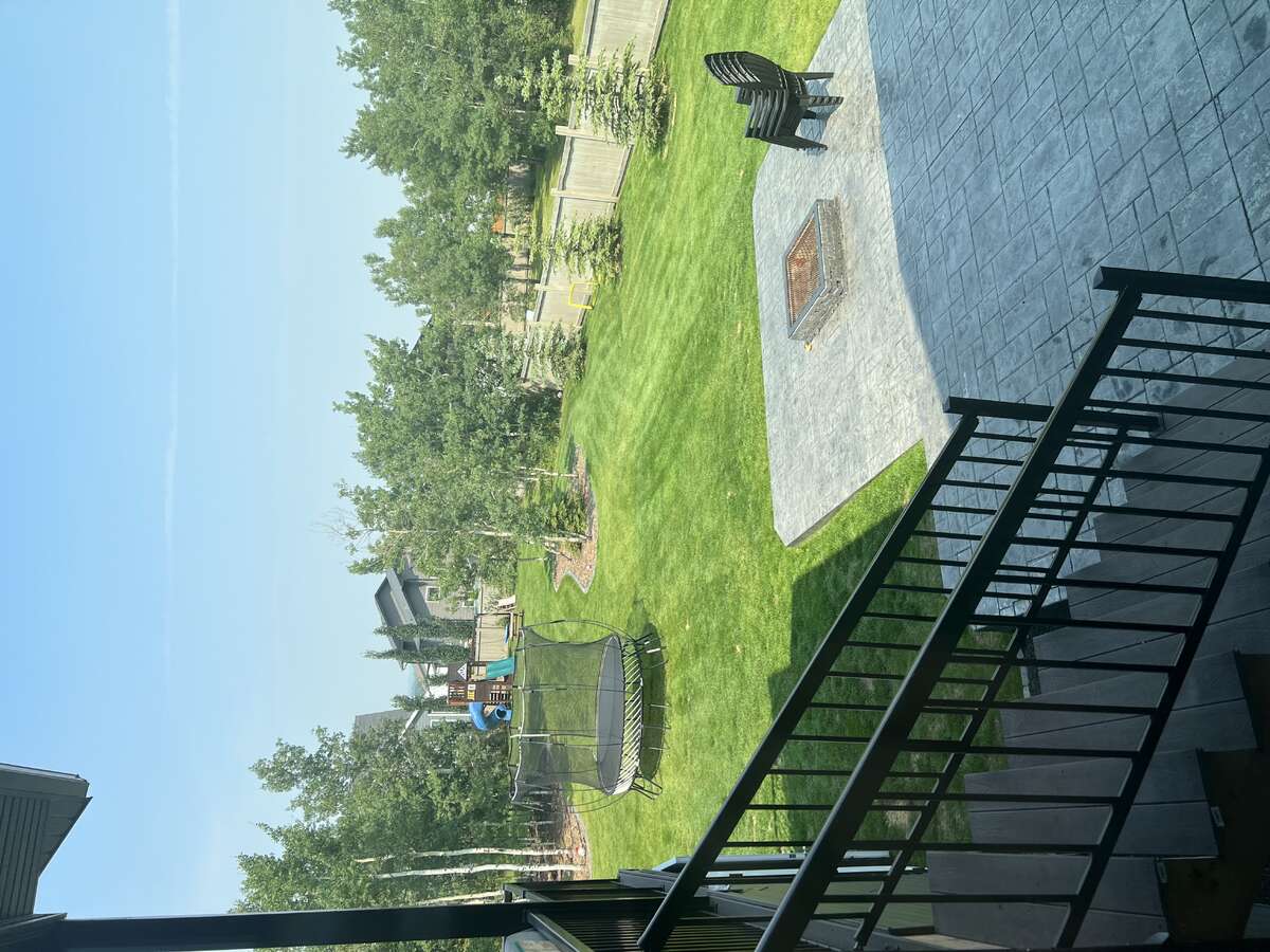 2 level stamped concrete pad with fire pit