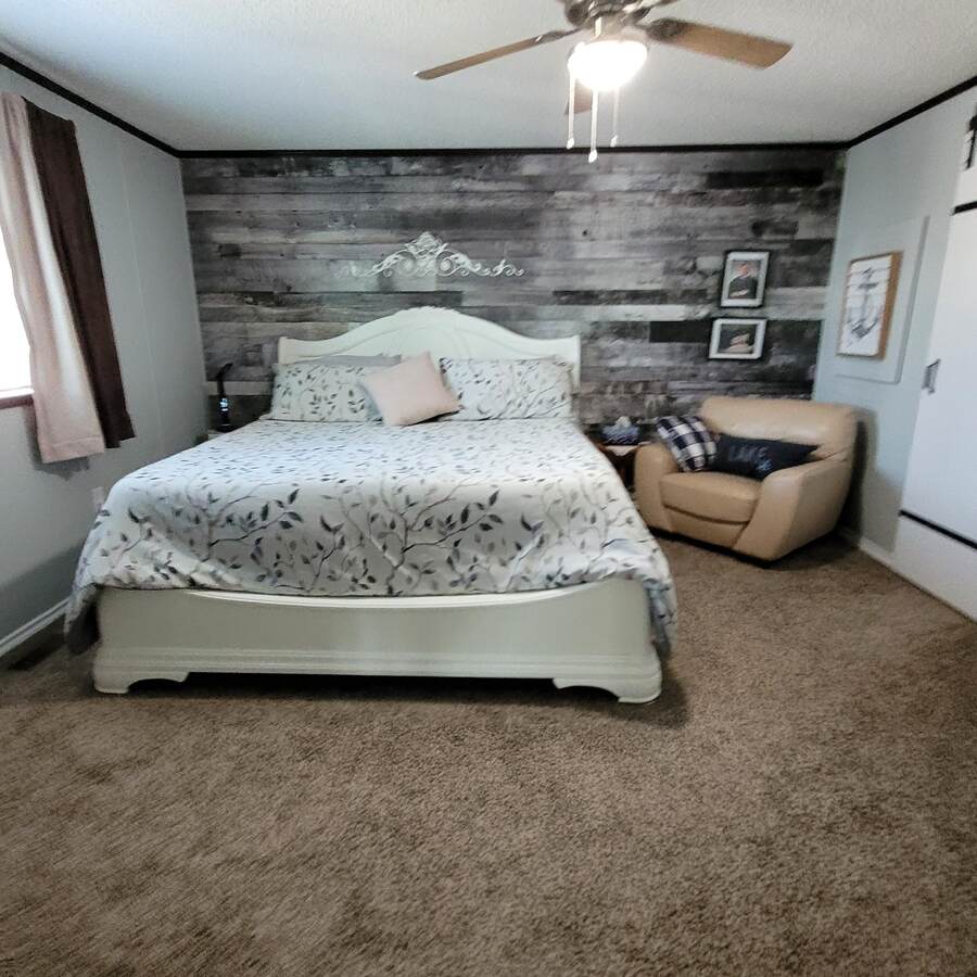 Master Bedroom shown with King size bed.