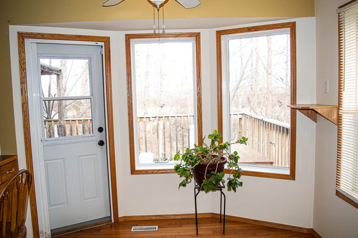 Granny suite bay window and entrance to back deck