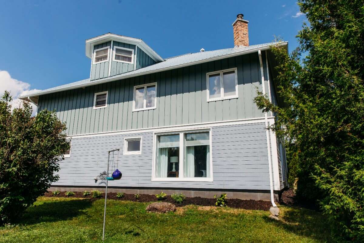 Distinctive Country Home on 6+/- Private Acres