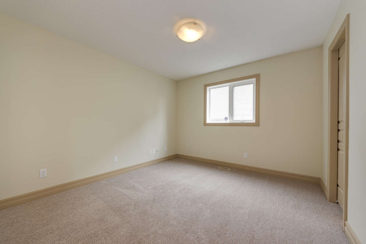 Office / Den on the Main Floor with a door to the 4pc Bathroom