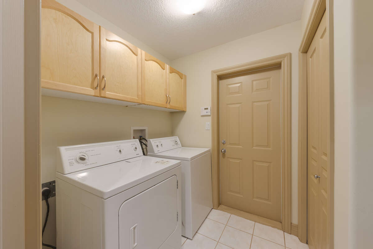 Laundry Room - Door to Garage & Closet Door