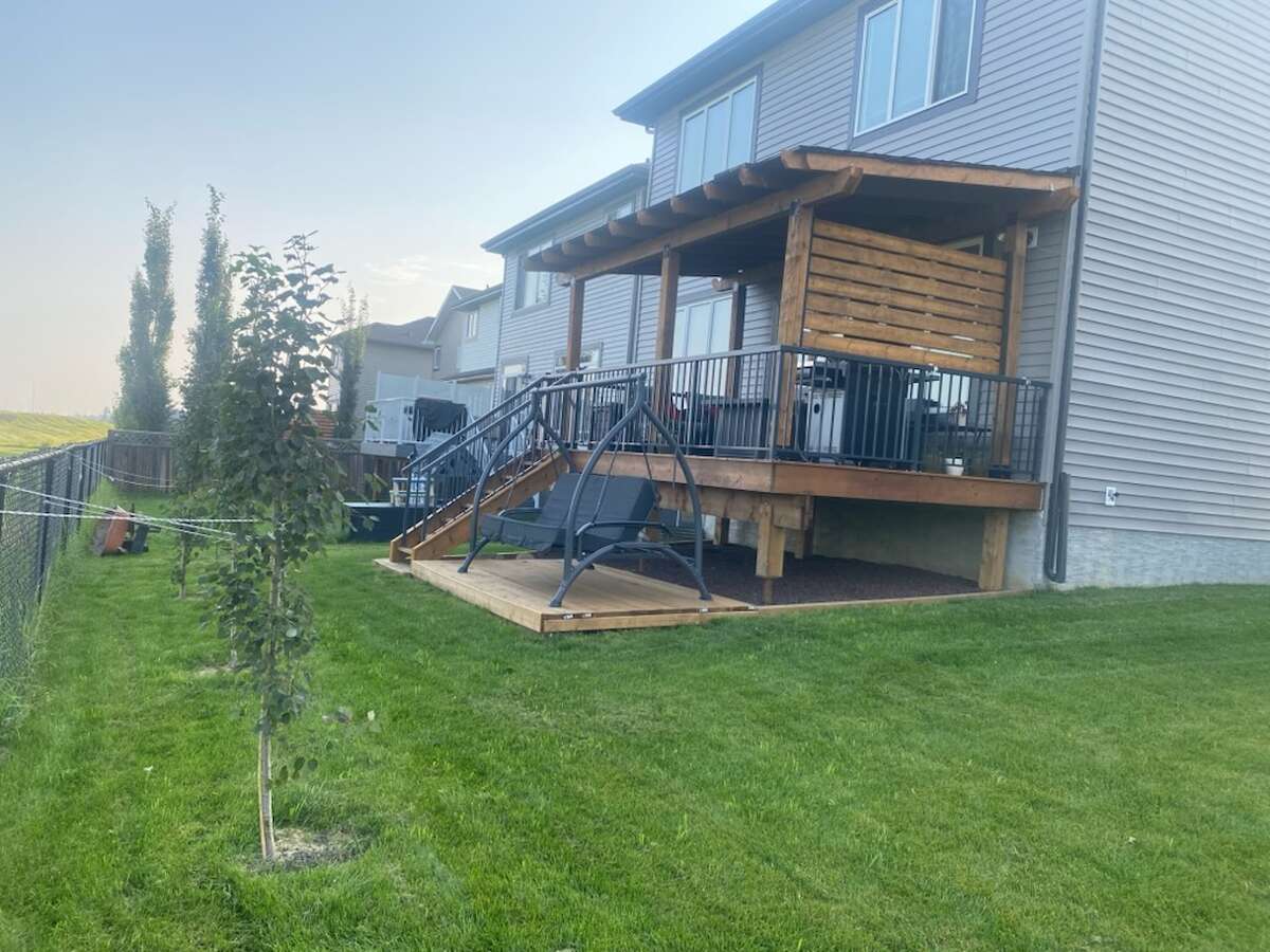 Cover deck offers options for enjoying your backyard, catch the sunset, and enjoy BBQs...