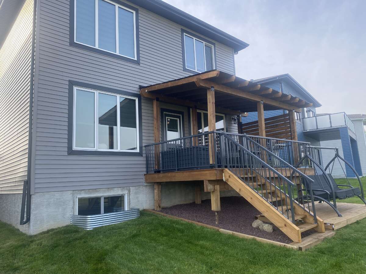 Cover deck offers options for enjoying your backyard, catch the sunset, and enjoy BBQs...