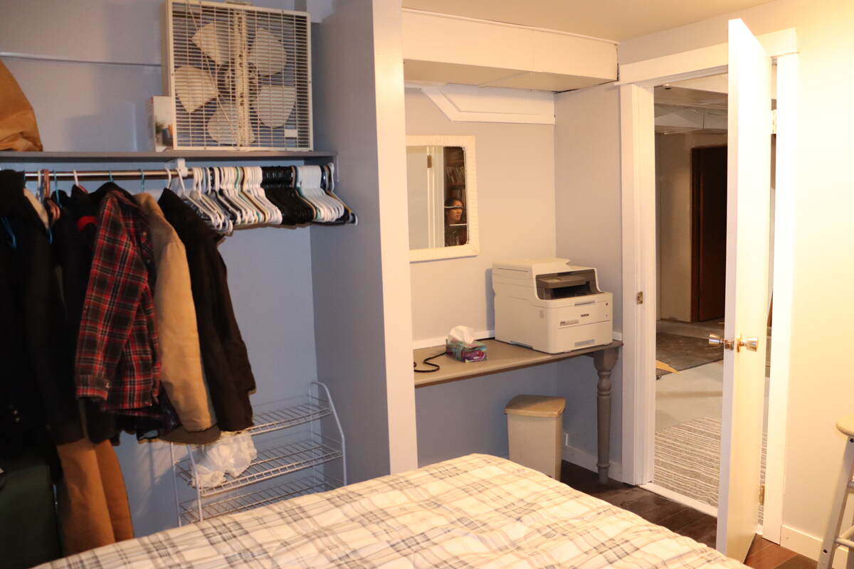 Basement bedroom view 1. Built in desk