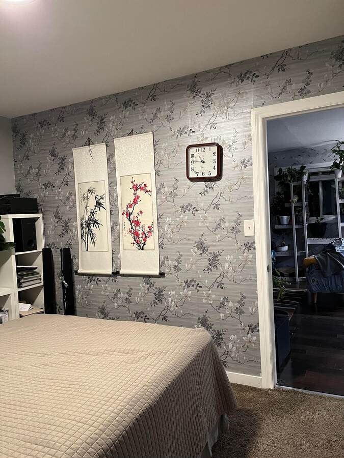 Wallpaper was ordered from England. Master bedroom