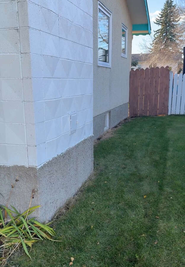 SIde of House with With Outdoor Tap