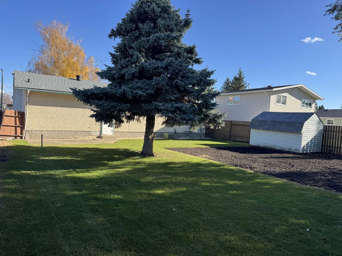 Expansive Backyard Space Looking Towards Back of House