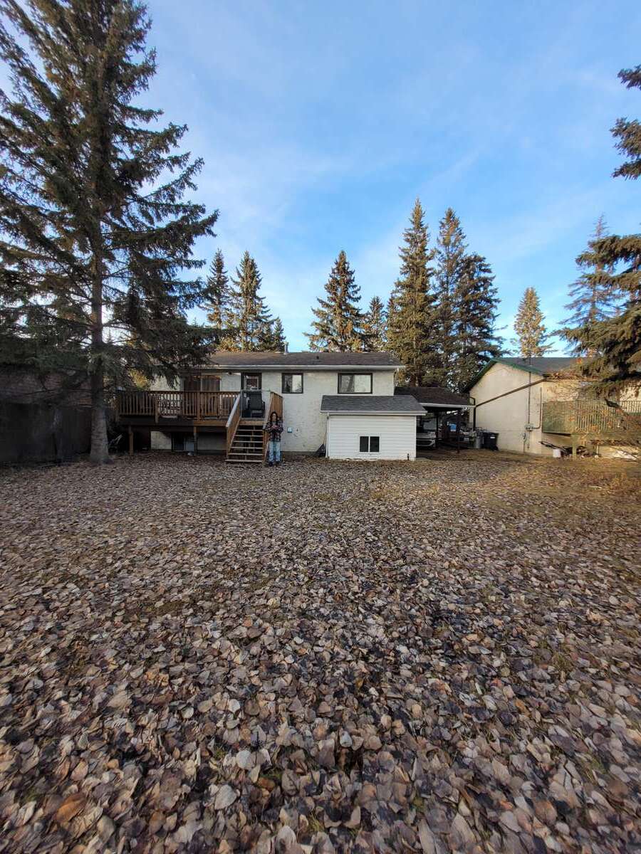 Revenue Property / Bungalow / Home with Unregistered Suite For Sale in Sylvan Lake, AB - 2+2 bed, 2 bath