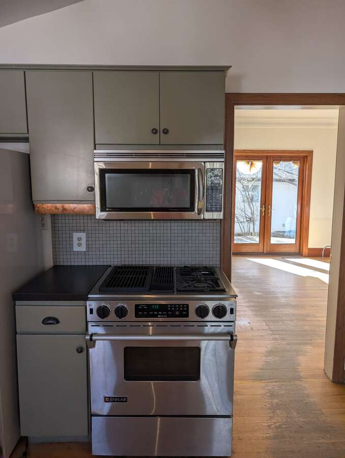 Kitchen with mico-wave and gas range