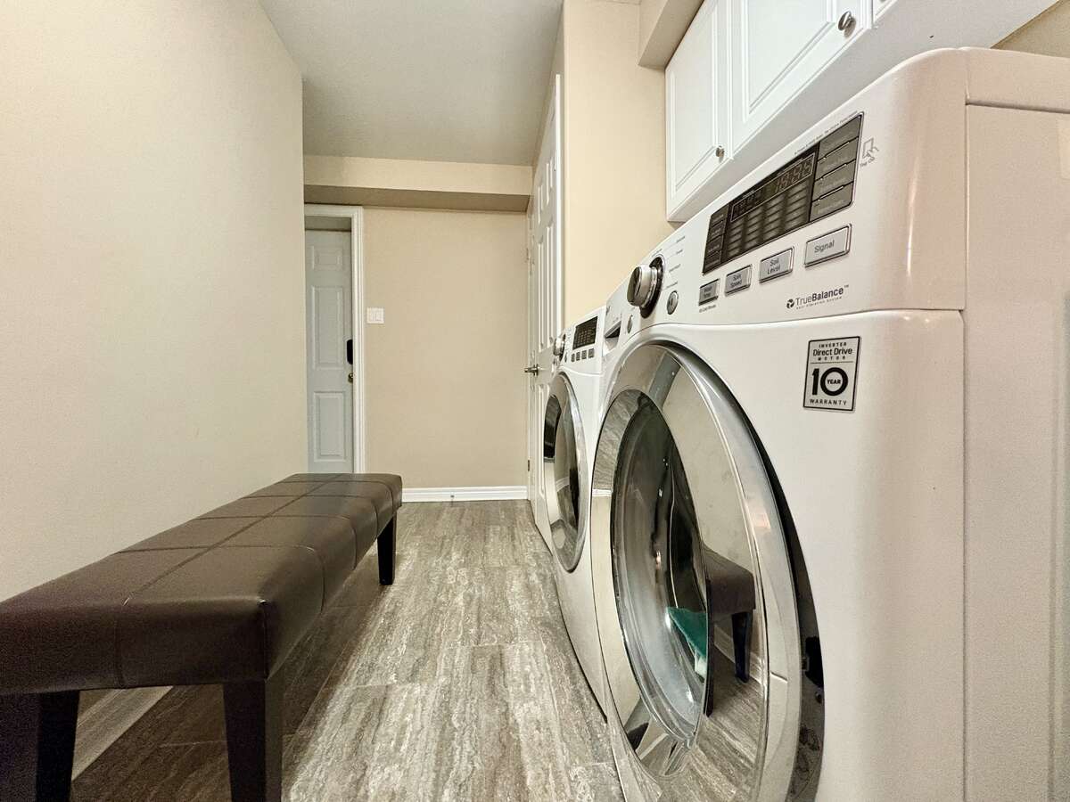 Nanny Suite Laundry with Private Entrance to Garage