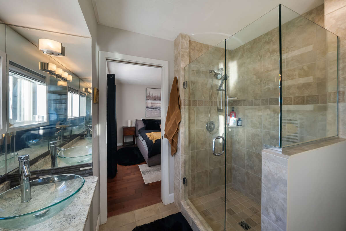 Master bedroom ensuite with a shower built for two