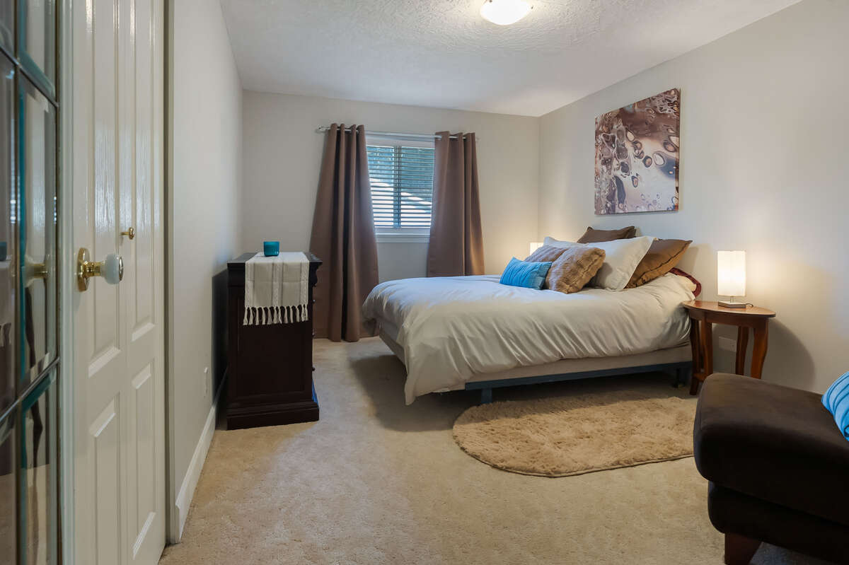 French doors open onto the mainfloor guest bedroom