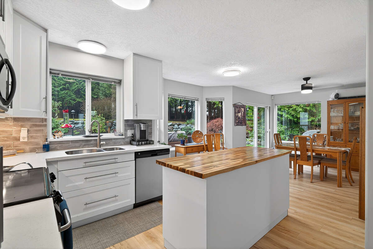 Open concept kitchen / dinning area with plenty of natural light.