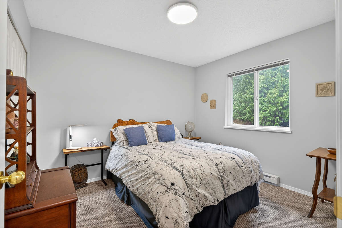 Bright 3rd bedroom with view to back gardens.