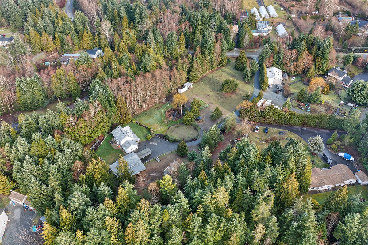 Ariel view looking back to road and driveway entrance to property