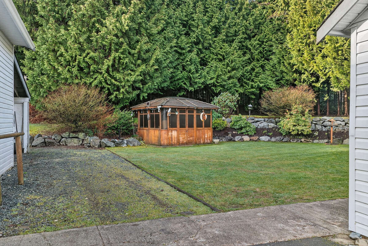 All flower beds are low maintance that produce bright beautiful perennials.