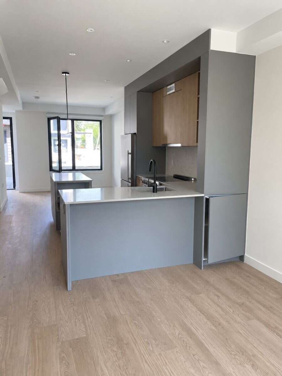 Nearly 1,700 Sq Ft End Unit with Huge Flex