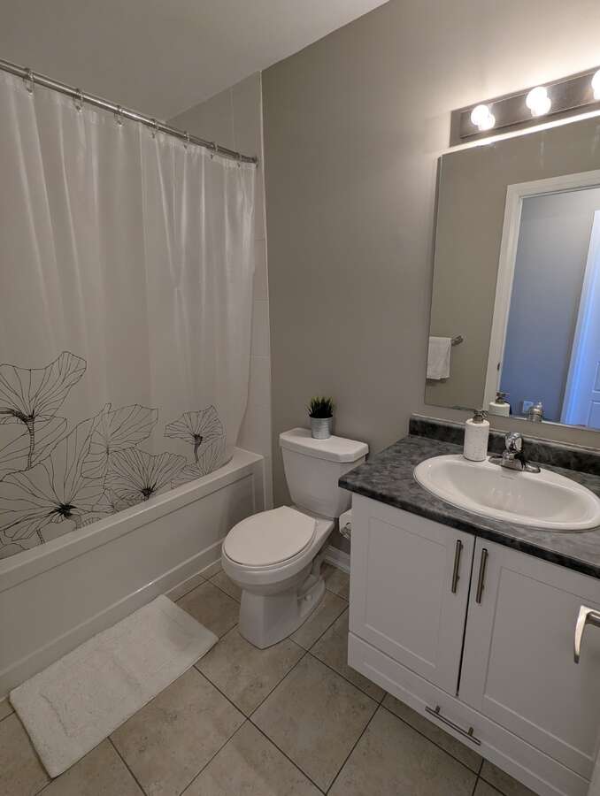 Second upstairs bathroom (with full bath)