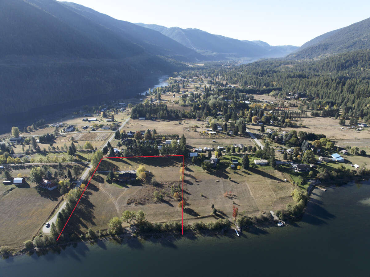 Aerial - waterfront, beach and property lines from north