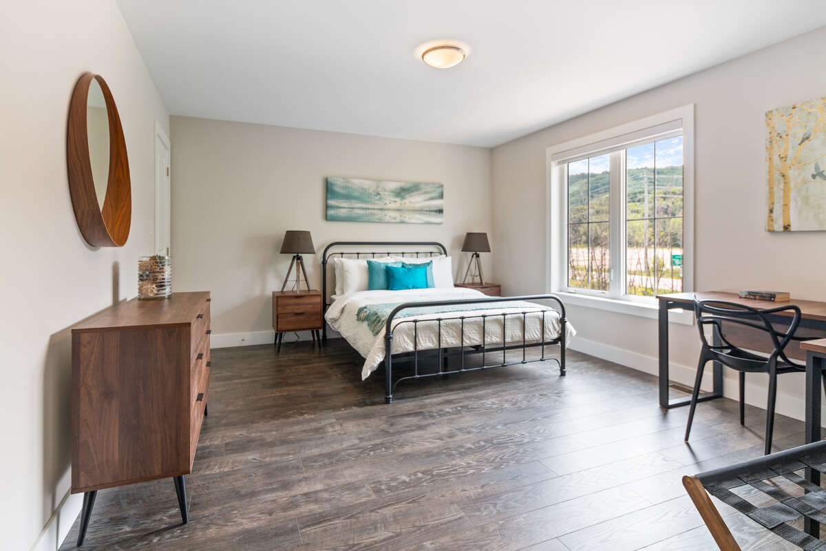 2nd Floor Large Bedroom with walk-in closet back left - full view of ski hills