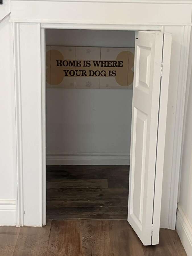 Storage under Stairs.  Great spot for that Four Legged Child to "chill"