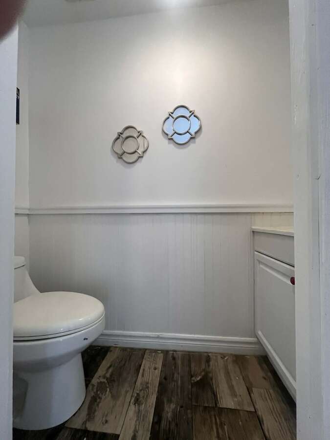 Lower Level 2 pc Bathroom just off the Back Entry (handy when working outside or for visitors)