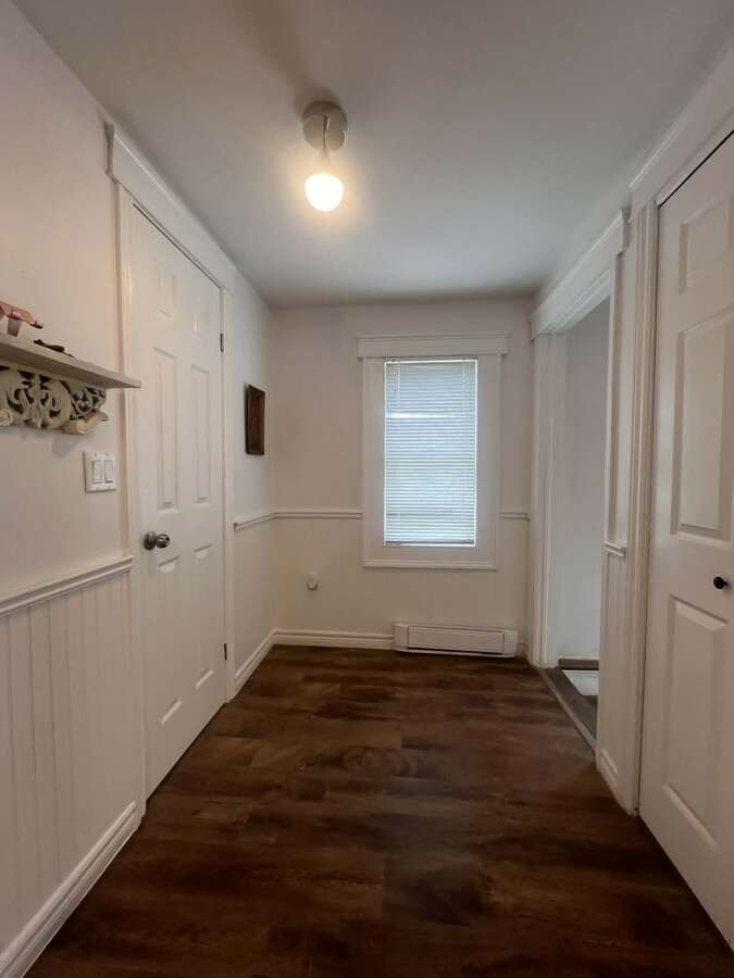View from Kitchen, Bathroom on the left, large closet on the right
