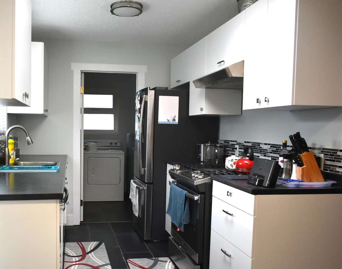 Kitchen with new appliances including gas stove
