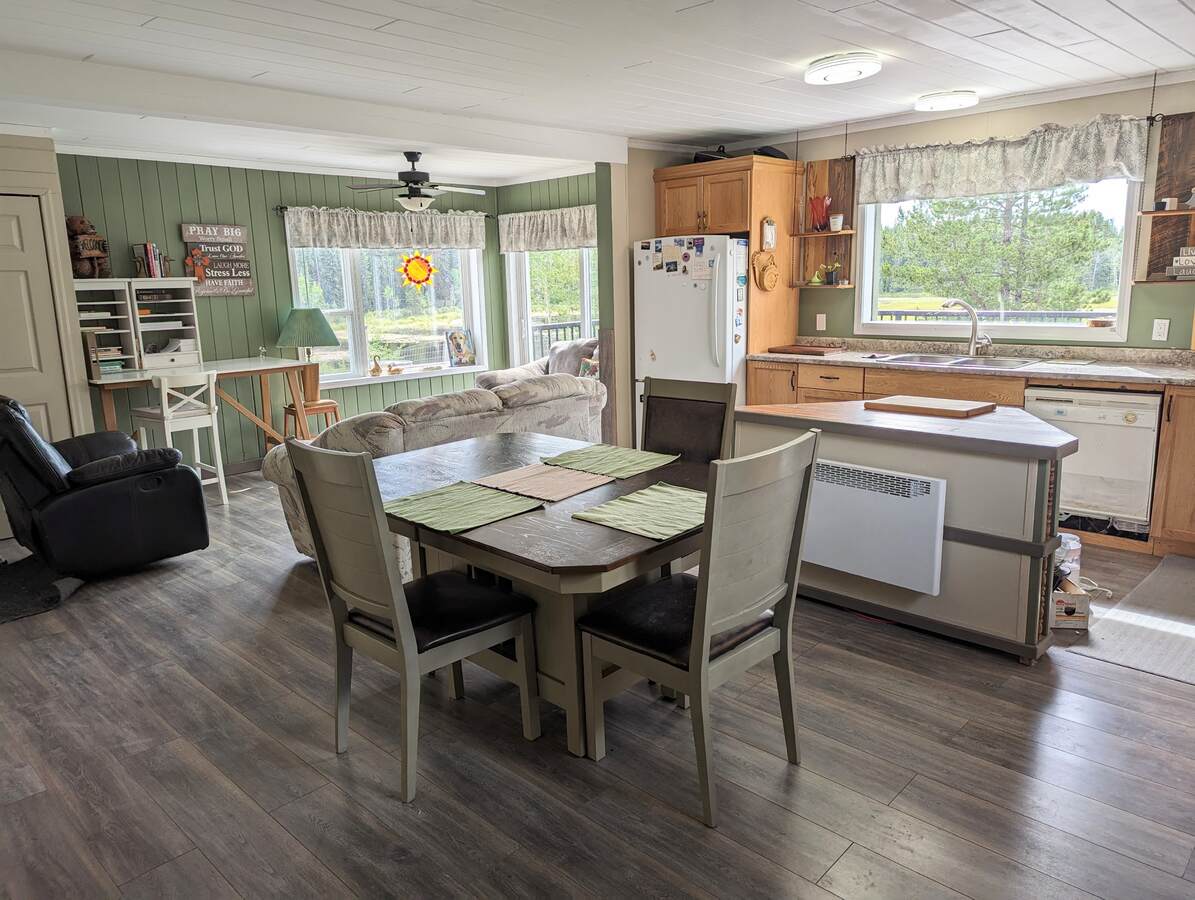 kitchen with sunny side seating living area