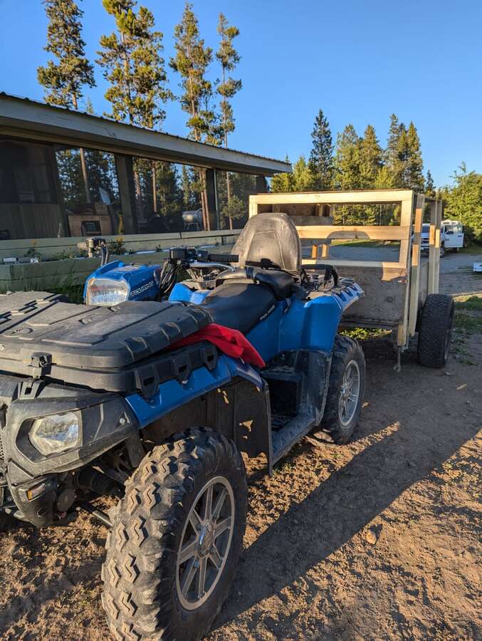 polaris atv with trailer for firewood and trail building