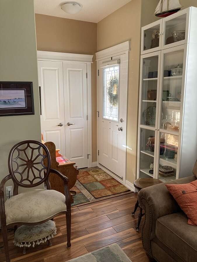 Bright front entry with coat closet