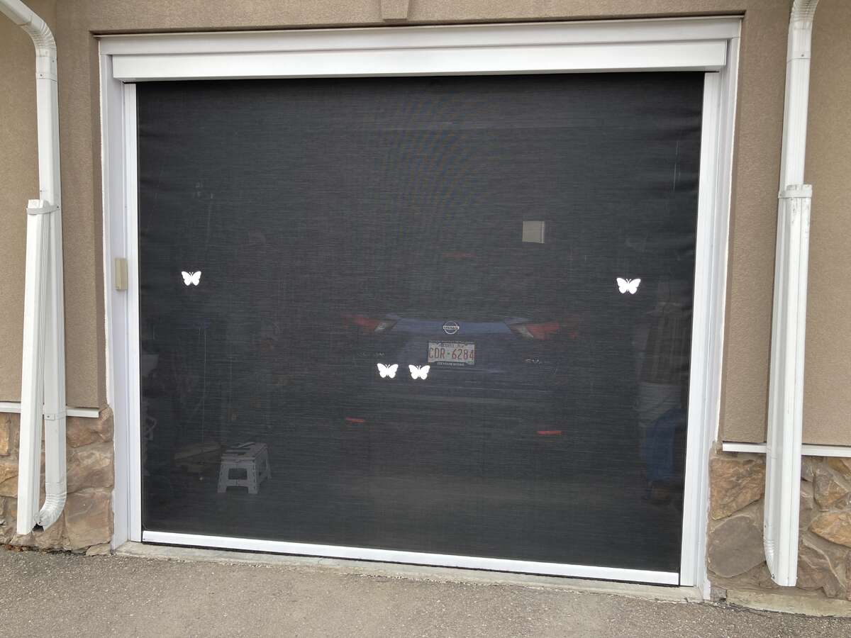 retractable garage door screen with 2 remotes