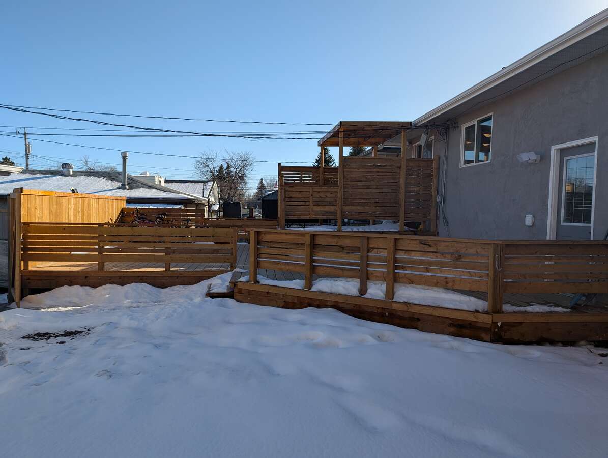 Rear deck and entrance to the basement