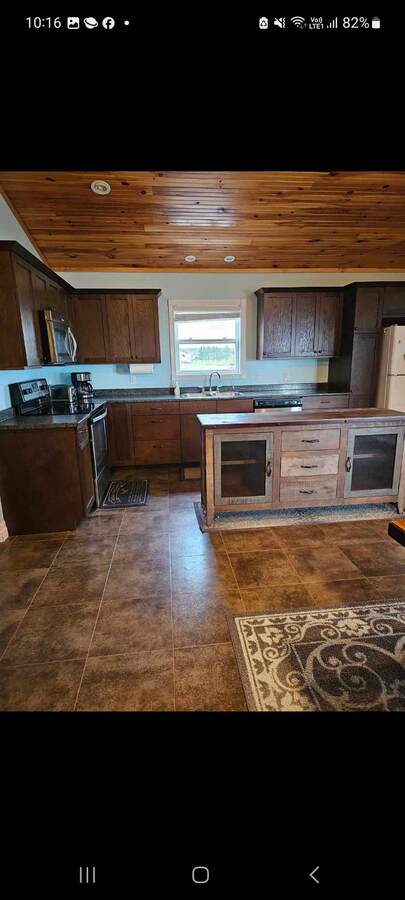 Kitchen with the island/bar