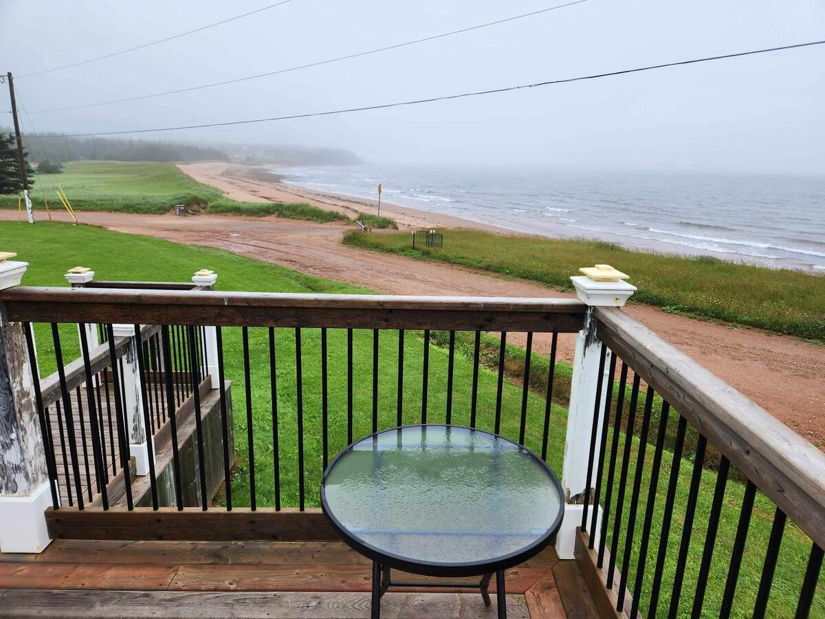 Far right side of the deck facing the ocean