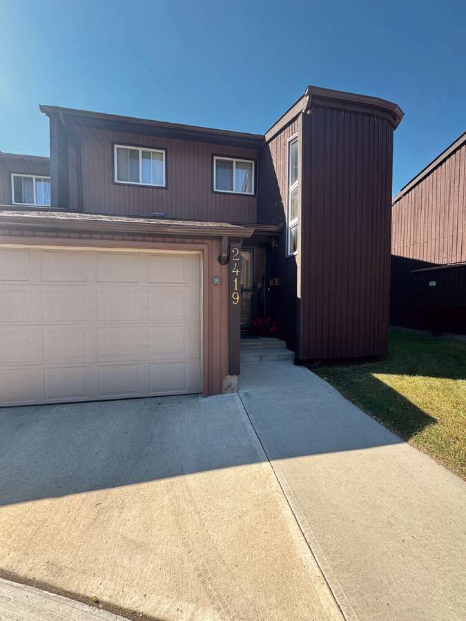 TOWNHOUSE END UNIT / DUPLEX WITH ATTACHED GARAGE