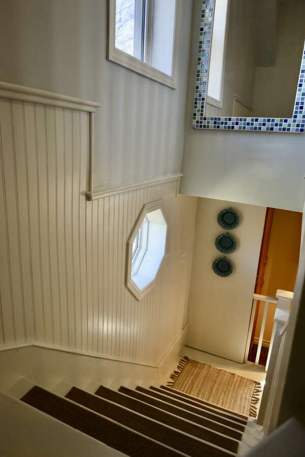 Looking down the stairs from upper to main level
