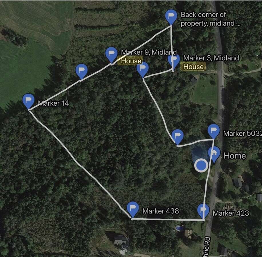The house is where "Home" is located, up by the road