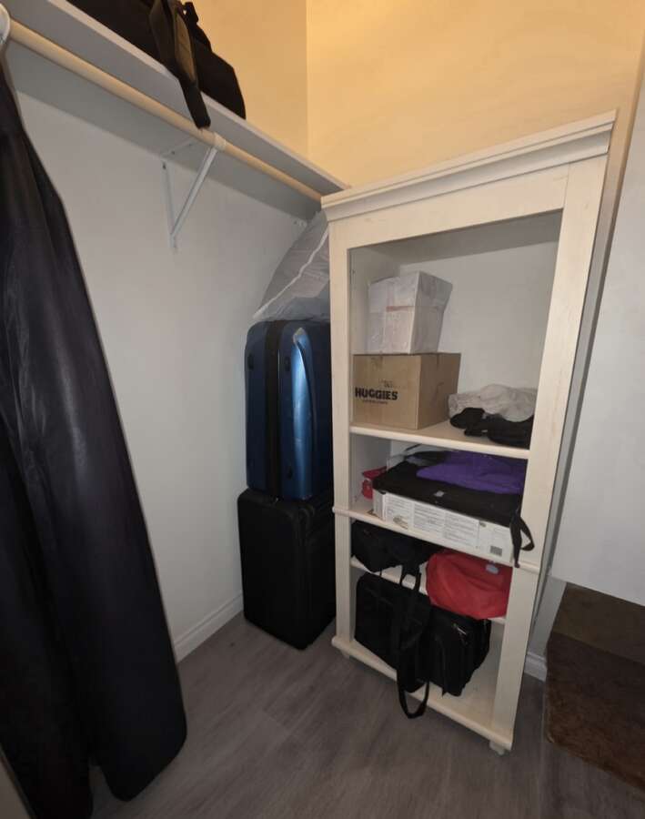 Walk-in closet storage area off of 4th bedroom/family room.